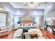 Spacious main bedroom featuring vaulted ceiling, a king-size bed, stylish decor, and ample natural light at 5359 Curtisston Ct, North Charleston, SC 29418
