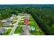 Overhead shot of a peaceful neighborhood with well-kept lawns and private driveways at 5509 Alpine Dr, Summerville, SC 29483
