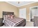 Bedroom with neutral walls, carpeted floors, and a full-sized bed, providing a restful personal space at 5509 Alpine Dr, Summerville, SC 29483