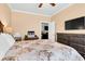 Comfortable bedroom featuring a work area, TV and doorway to another room at 5509 Alpine Dr, Summerville, SC 29483