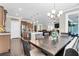 Open concept living area with a dining room, kitchen, and living room provides ample space for entertaining at 5509 Alpine Dr, Summerville, SC 29483