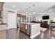 Open concept living area with a kitchen and living room provides ample space for entertaining and relaxing at 5509 Alpine Dr, Summerville, SC 29483
