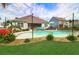 Inviting in-ground pool area perfect for entertaining and relaxation with a covered porch nearby at 5509 Alpine Dr, Summerville, SC 29483