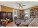 Charming living room with wood-paneled walls, built-in bookshelves, and a comfortable seating area at 5519 Jefferies Hwy, Walterboro, SC 29488