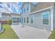 Spacious backyard with a concrete patio and vinyl siding at 575 Rosings Dr, Summerville, SC 29486