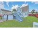 Fenced backyard features a deck and above-ground pool at 575 Rosings Dr, Summerville, SC 29486