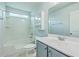 Well-lit bathroom with a shower-tub combo, large mirror, and updated vanity at 575 Rosings Dr, Summerville, SC 29486