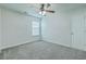 Bright bedroom with gray carpet, white walls, a ceiling fan, and natural light at 575 Rosings Dr, Summerville, SC 29486