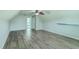 Spacious bedroom featuring gray wood-look floors, and a ceiling fan at 575 Rosings Dr, Summerville, SC 29486