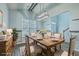 Elegant dining room with stylish light fixture and views of the front entryway at 575 Rosings Dr, Summerville, SC 29486