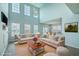 Open living room and kitchen with modern design, natural light, and bright interior at 575 Rosings Dr, Summerville, SC 29486