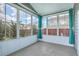 Cozy sunroom with large windows and neutral walls at 575 Rosings Dr, Summerville, SC 29486