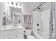 Clean bathroom with vanity, toilet, shower and floral curtain at 622 Windermere Blvd # D, Charleston, SC 29407