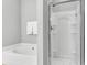Bathroom with a bathtub and glass enclosed shower at 622 Windermere Blvd # D, Charleston, SC 29407