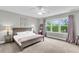 Spacious bedroom with natural light and calming decor at 622 Windermere Blvd # D, Charleston, SC 29407