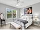Comfortable bedroom featuring a ceiling fan, bench and artwork at 622 Windermere Blvd # D, Charleston, SC 29407