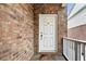 Charming front door with brick surround and welcome mat, enhancing curb appeal at 622 Windermere Blvd # D, Charleston, SC 29407