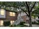 Attractive brick townhome boasting white stairs, neat landscaping, and an inviting entrance at 622 Windermere Blvd # D, Charleston, SC 29407