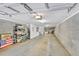 Spacious garage with concrete block walls and high ceilings offers ample storage and workspace at 622 Windermere Blvd # D, Charleston, SC 29407