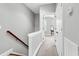 Upstairs hallway offers a clean and well-lit area leading to various rooms at 622 Windermere Blvd # D, Charleston, SC 29407