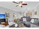 Inviting living room area with TV, open floor plan, and modern furnishings at 622 Windermere Blvd # D, Charleston, SC 29407