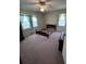 Spacious bedroom with wallpaper and large windows at 686 W Pine St, Varnville, SC 29944