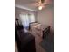 Cozy bedroom features a comfortable bed, dresser, and vintage decor at 686 W Pine St, Varnville, SC 29944
