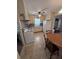 Functional eat-in kitchen with vintage appliances and ample storage at 686 W Pine St, Varnville, SC 29944