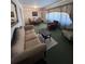 Comfortable living room with sofas, dining table, and vintage decor at 686 W Pine St, Varnville, SC 29944