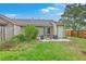 Outdoor living with patio and furniture, privacy fence and green grass at 7300 Suncatcher Dr, Hanahan, SC 29410