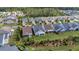 Aerial view of the house surrounded by lush green landscaping and neighboring homes at 105 Harbor Trace Ln, Summerville, SC 29486