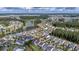 Community aerial showcases the neighborhood's layout with ponds, landscaping, and well-spaced homes at 105 Harbor Trace Ln, Summerville, SC 29486
