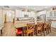 Spacious kitchen with white cabinets, granite countertops, an island and stainless steel appliances at 105 Harbor Trace Ln, Summerville, SC 29486