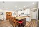 Kitchen with a large island with granite countertop, white cabinets, and stainless steel appliances at 105 Harbor Trace Ln, Summerville, SC 29486
