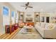 Living room with large windows, ceiling fan, and comfortable seating at 105 Harbor Trace Ln, Summerville, SC 29486