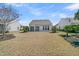 Wide backyard with a patio and well maintained lawn, perfect for outdoor entertaining at 109 Billowing Sails St, Summerville, SC 29486