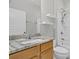 Bathroom featuring updated vanity with granite top, single sink and tub at 109 Billowing Sails St, Summerville, SC 29486