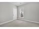 Bright bedroom features neutral carpet and window view at 109 Billowing Sails St, Summerville, SC 29486