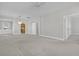 Large living room offering contemporary lighting, a sliding barn door, and easy access to other parts of the house at 109 Billowing Sails St, Summerville, SC 29486