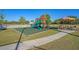 Attractive community playground with climbing and sliding features, perfect for Gathering fun, in a beautifully landscaped space at 109 Billowing Sails St, Summerville, SC 29486