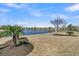 Scenic view of the pond highlighting landscaping and the neighborhood at 109 Billowing Sails St, Summerville, SC 29486