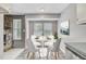 Charming dining nook featuring a round table with modern chairs, bathed in soft natural light at 109 Salem Ct, Summerville, SC 29486