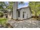 This home features white siding and a red roof with a concrete patio at 109 Salem Ct, Summerville, SC 29486