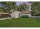 Charming one-story home featuring a green lawn, classic siding, and mature trees against a colorful sunset backdrop at 109 Salem Ct, Summerville, SC 29486