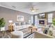 Stylish living room features a stone fireplace, plush seating, and bright natural light at 109 Salem Ct, Summerville, SC 29486