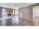 Cozy living room showcasing a stone fireplace, stylish flooring, and an open layout at 109 Salem Ct, Summerville, SC 29486