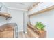 Convenient laundry room with built-in shelves and cabinets, and ample storage space at 114 Bailey Dr, Summerville, SC 29485