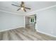 Spacious living room with stylish floors, neutral walls, and an open doorway to the kitchen at 114 Bailey Dr, Summerville, SC 29485