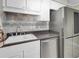 Contemporary kitchen featuring updated cabinets and stainless steel refrigerator at 114 Stewart St, Goose Creek, SC 29445