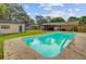 Backyard view with large in-ground pool and storage shed at 114 Stewart St, Goose Creek, SC 29445